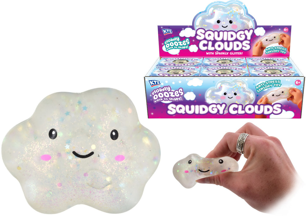 Squidgy Cloud toy with packaging and a hand holding a small version of the toy.